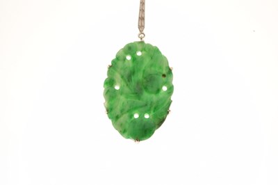 Lot 75 - Dyed carved jade pendant