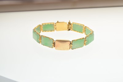 Lot 85 - Jade and yellow metal panel bracelet