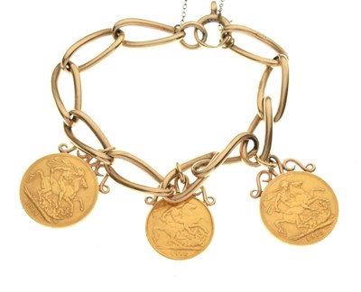 Lot 86 - 9ct gold bracelet attached two gold sovereigns and one half sovereign