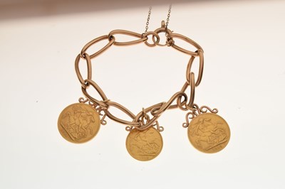 Lot 86 - 9ct gold bracelet attached two gold sovereigns and one half sovereign