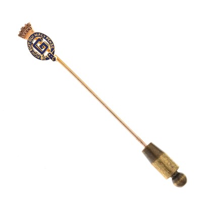Lot 50 - Royal Interest - Yellow metal and blue enamel stick pin