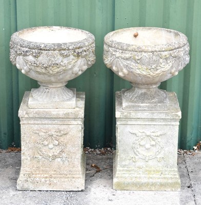 Lot 636 - Pair of composition garden urns and pedestals