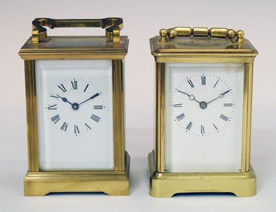 Lot 543 - Two brass cased single barrel carriage time pieces