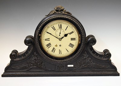 Lot 537 - Ebonised ships bulkhead clock in carved surround