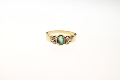 Lot 16 - Emerald and diamond dress ring