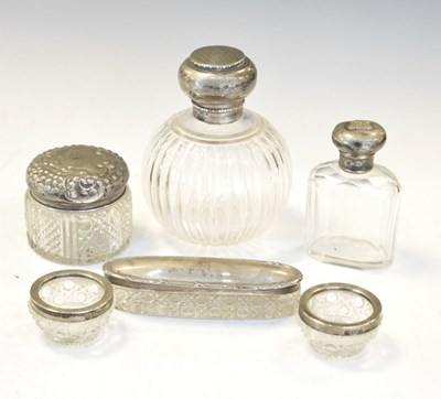 Lot 132 - Quantity of late 19th/ early 20th Century silver top dressing table bottles