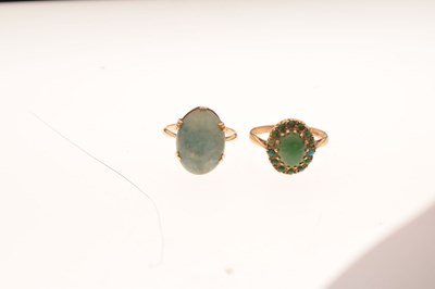 Lot 37 - Two 9ct gold green hardstone set dress rings