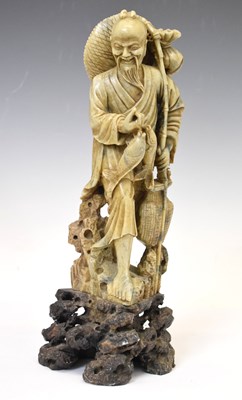 Lot 415 - Japanese carved soapstone figure of a fisherman