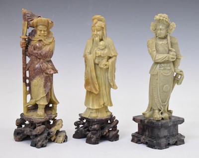 Lot 416 - Three carved soapstone figures