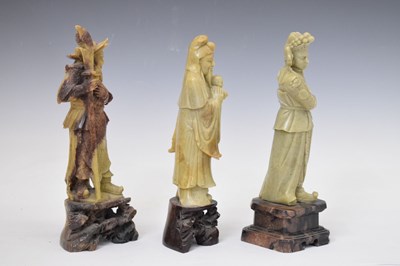 Lot 416 - Three carved soapstone figures