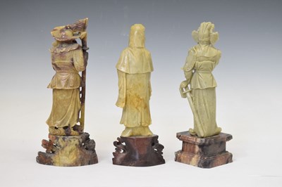 Lot 416 - Three carved soapstone figures