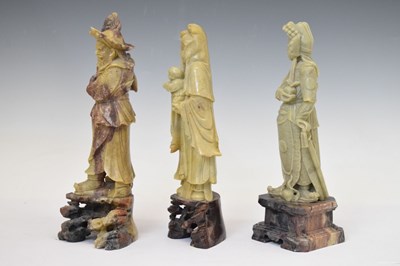 Lot 416 - Three carved soapstone figures