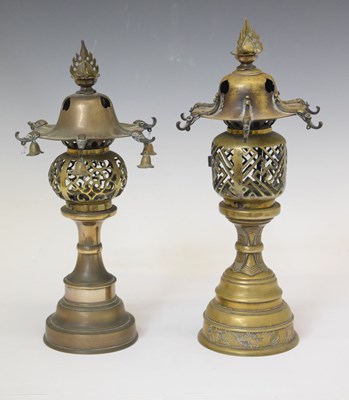 Lot 414 - Two Far Eastern brass table lamps