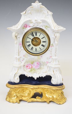 Lot 565 - Continental porcelain mantel clock