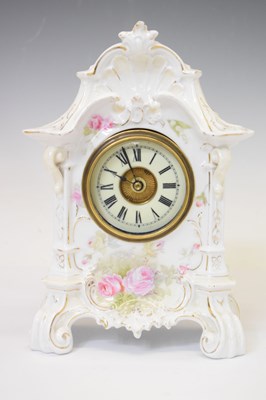 Lot 565 - Continental porcelain mantel clock