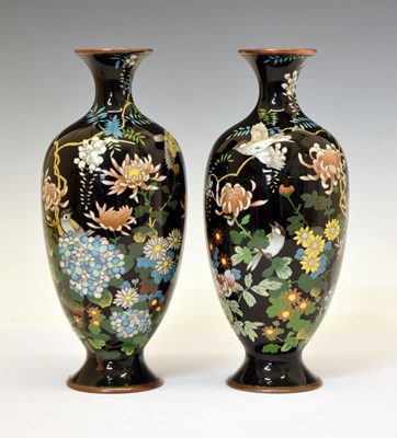 Lot 482 - Pair of Japanese Meiji period black ground cloisonné vases