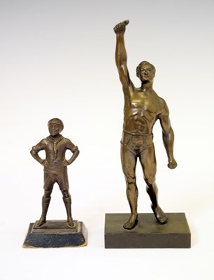 Lot 210 - Cast figure of a Boy Scout and spelter figure of a wrestler