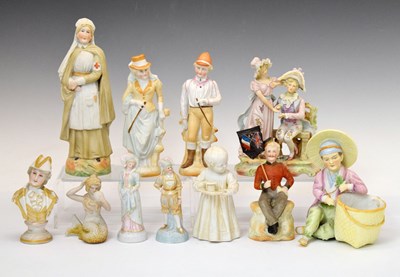 Lot 324 - Group of small bisque porcelain figures