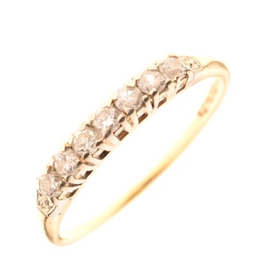 Lot 10 - Seven stone diamond half eternity ring