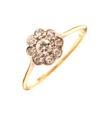 Lot 11 - Diamond daisy cluster ring, stamped '18ct'