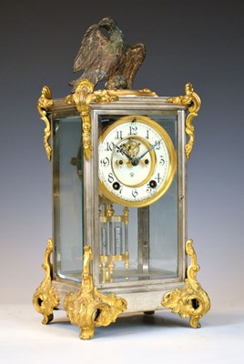 Lot 559 - Ansonia American silvered and gilt four-glass mantel clock