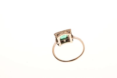 Lot 29 - Emerald and diamond cluster ring