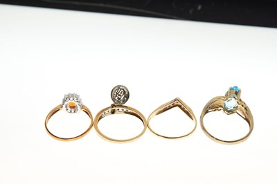 Lot 17 - Four 9ct gold and gem-set dress rings