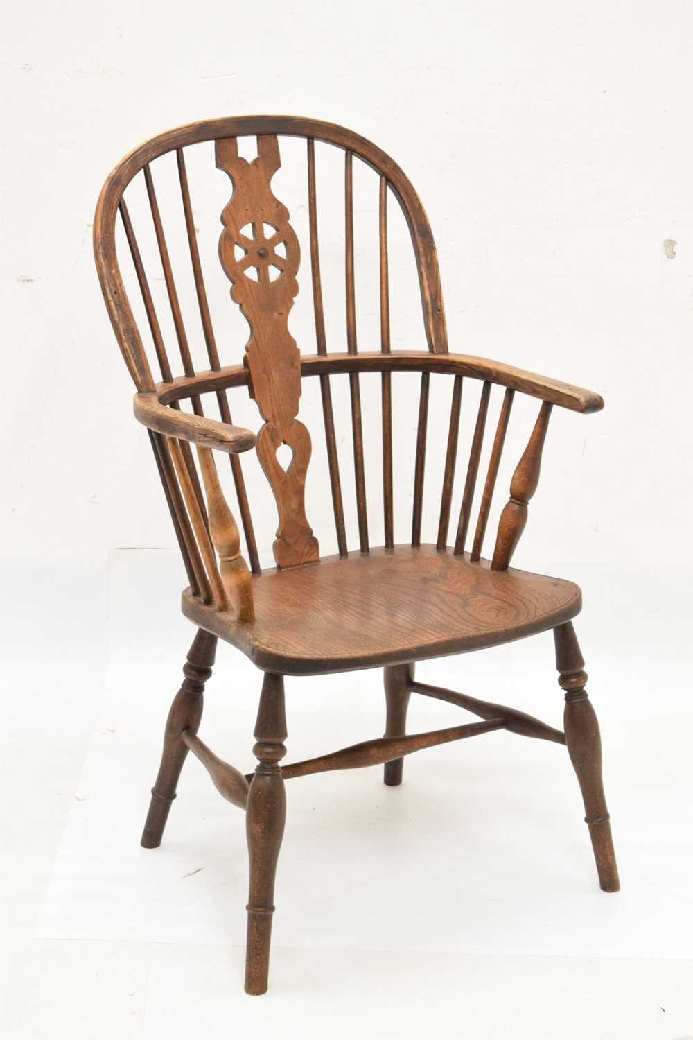 Lot 597 - Late 19th Century ash and elm wheel back Windsor chair