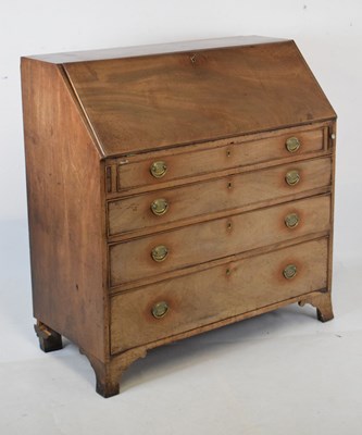 Lot 581 - George III mahogany bureau comprising of four long drawers