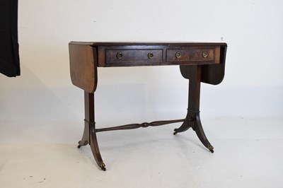 Lot 599 - Reproduction mahogany sofa table