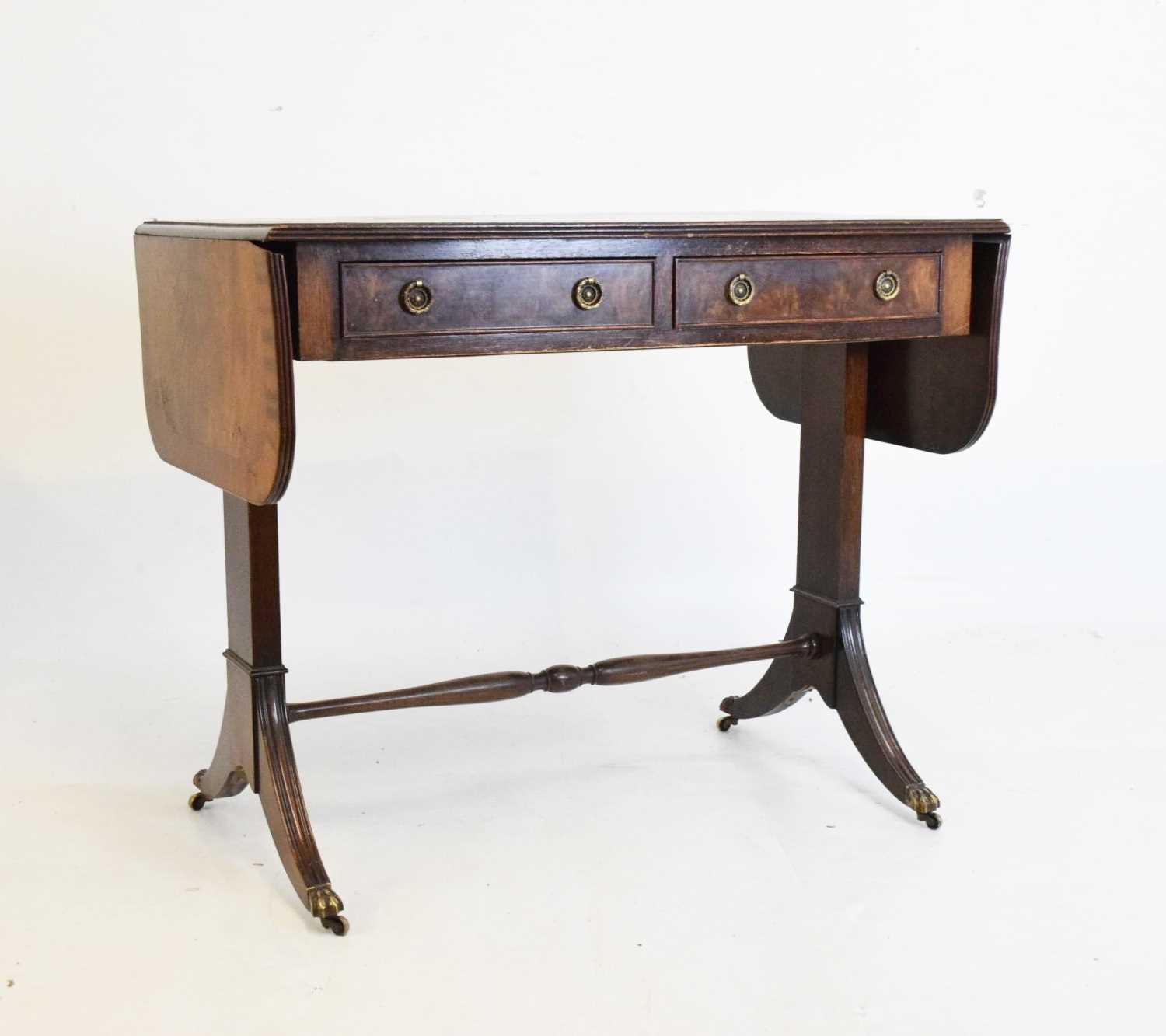 Lot 599 - Reproduction mahogany sofa table