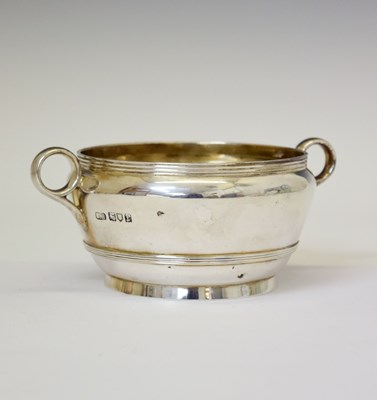 Lot 120 - Harrods retailer - George V silver two-handled bowl of circular ogee form, London 1914