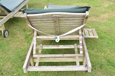 Lot 560 - Pair of teak garden sun loungers