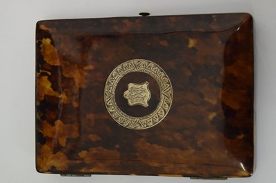 Lot 232 - Tortoiseshell shell purse with silver inlay crest