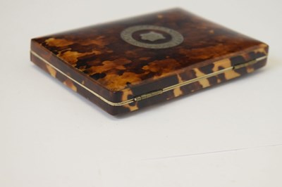 Lot 232 - Tortoiseshell shell purse with silver inlay crest