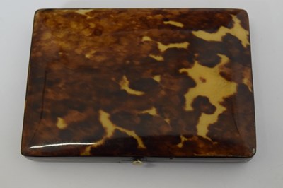 Lot 232 - Tortoiseshell shell purse with silver inlay crest