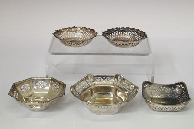 Lot 130 - Four silver bonbon dishes together with a plated example