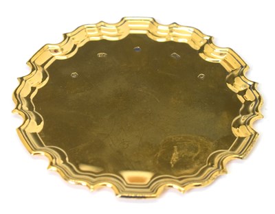 Lot 153 - Elizabeth II silver-gilt pie crust waiter