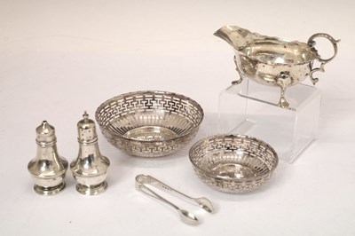 Lot 127 - Victorian silver sauce boat, with a collection of small silver items and two silver-plated bobbon dishes