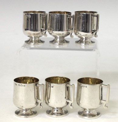 Lot 117 - Set of six George V silver miniature tankards