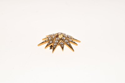 Lot 21 - Late Victorian seed pearl and diamond starburst brooch