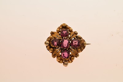 Lot 96 - Filigree brooch set five faceted pink coloured stones