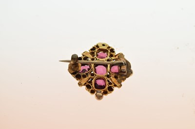 Lot 96 - Filigree brooch set five faceted pink coloured stones