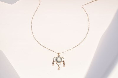 Lot 30 - Pendant and chain set pale blue stone and seed pearls, unmarked yellow metal