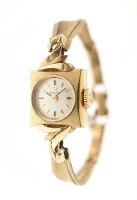 Lot 109 - Omega - Lady's 14k gold square cased cocktail watch