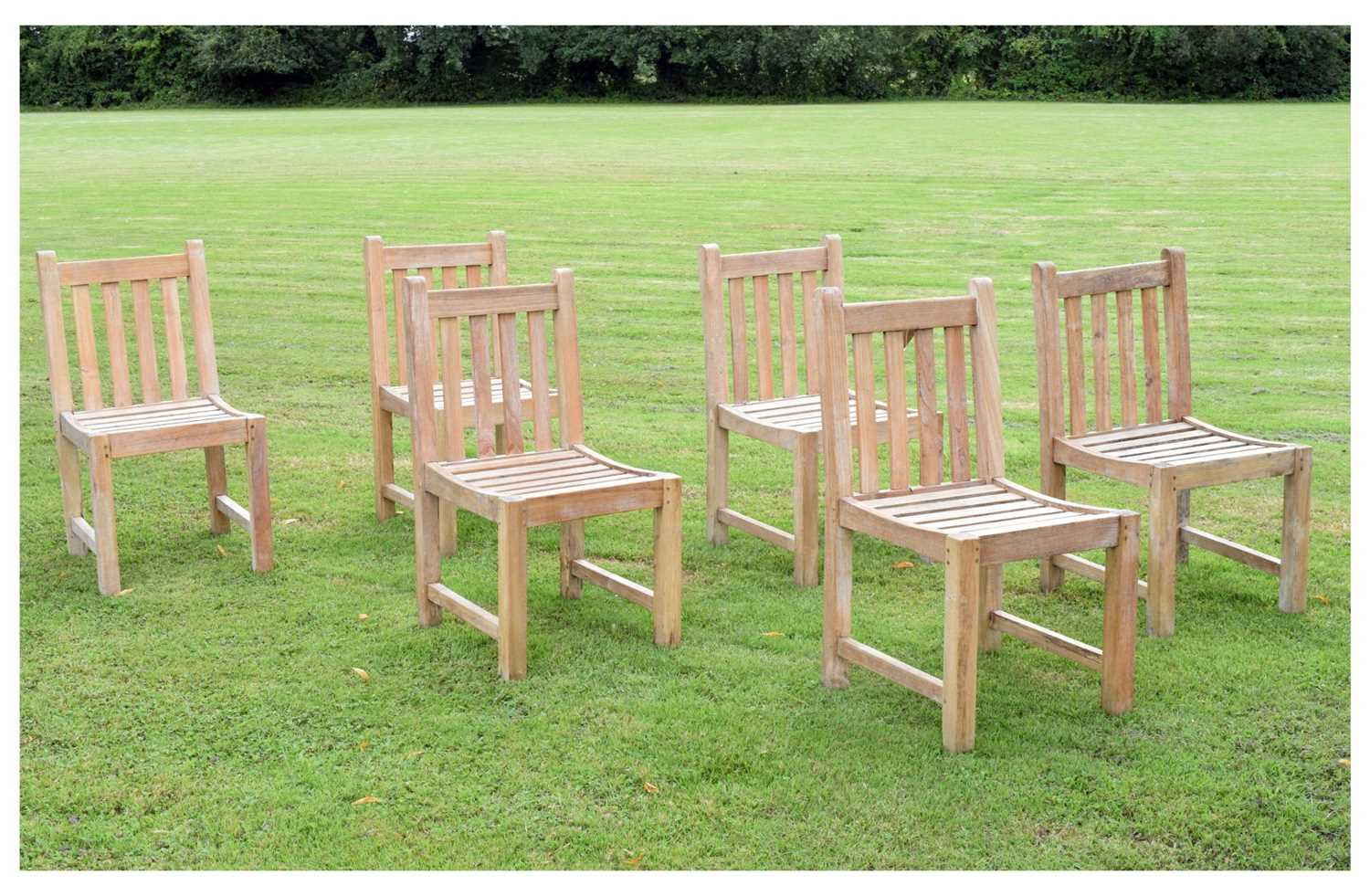 Lot 573 Set of six teak garden chairs