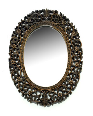 Lot 690 - Indian carved wall mirror