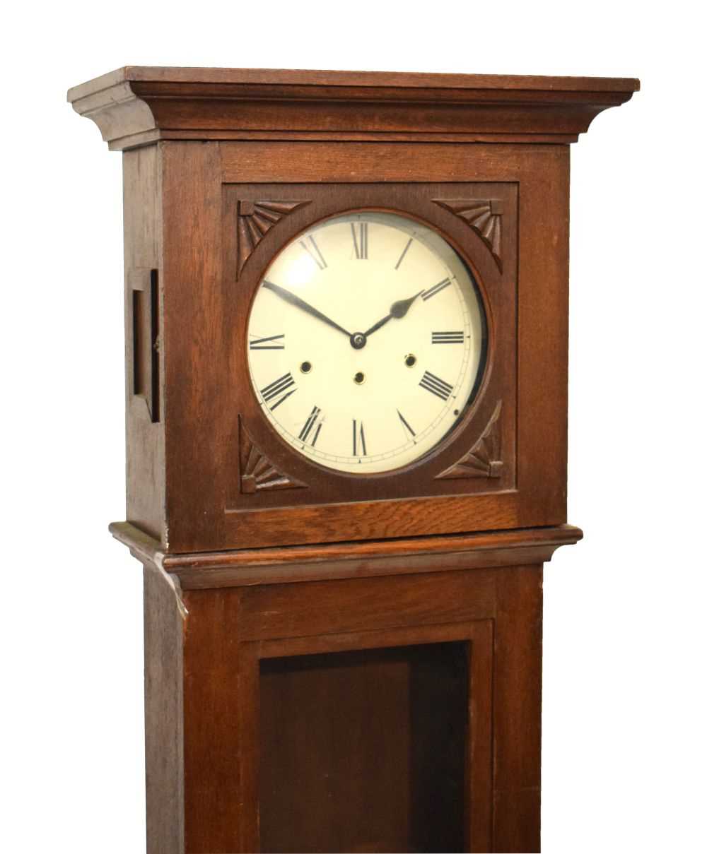 Lot 375 - Early 20th Century oak longcase clock