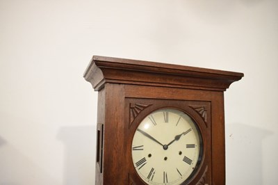 Lot 375 - Early 20th Century oak longcase clock