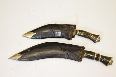 Lot 301 - Nepalese kukri of traditional form and three smaller kukris